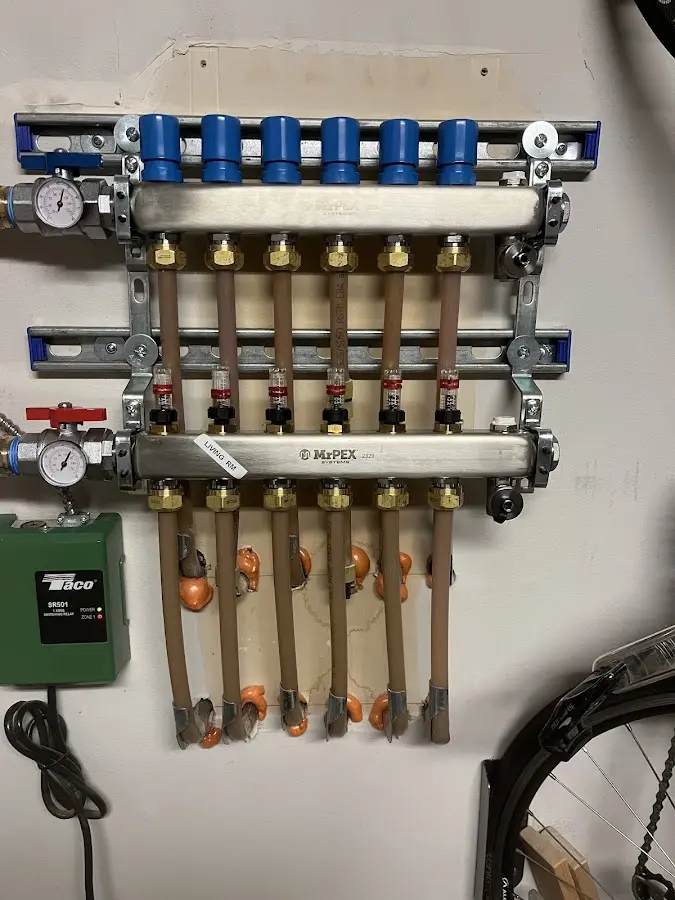 Plumber performing Gas Leak Detection at a residential property in The Village